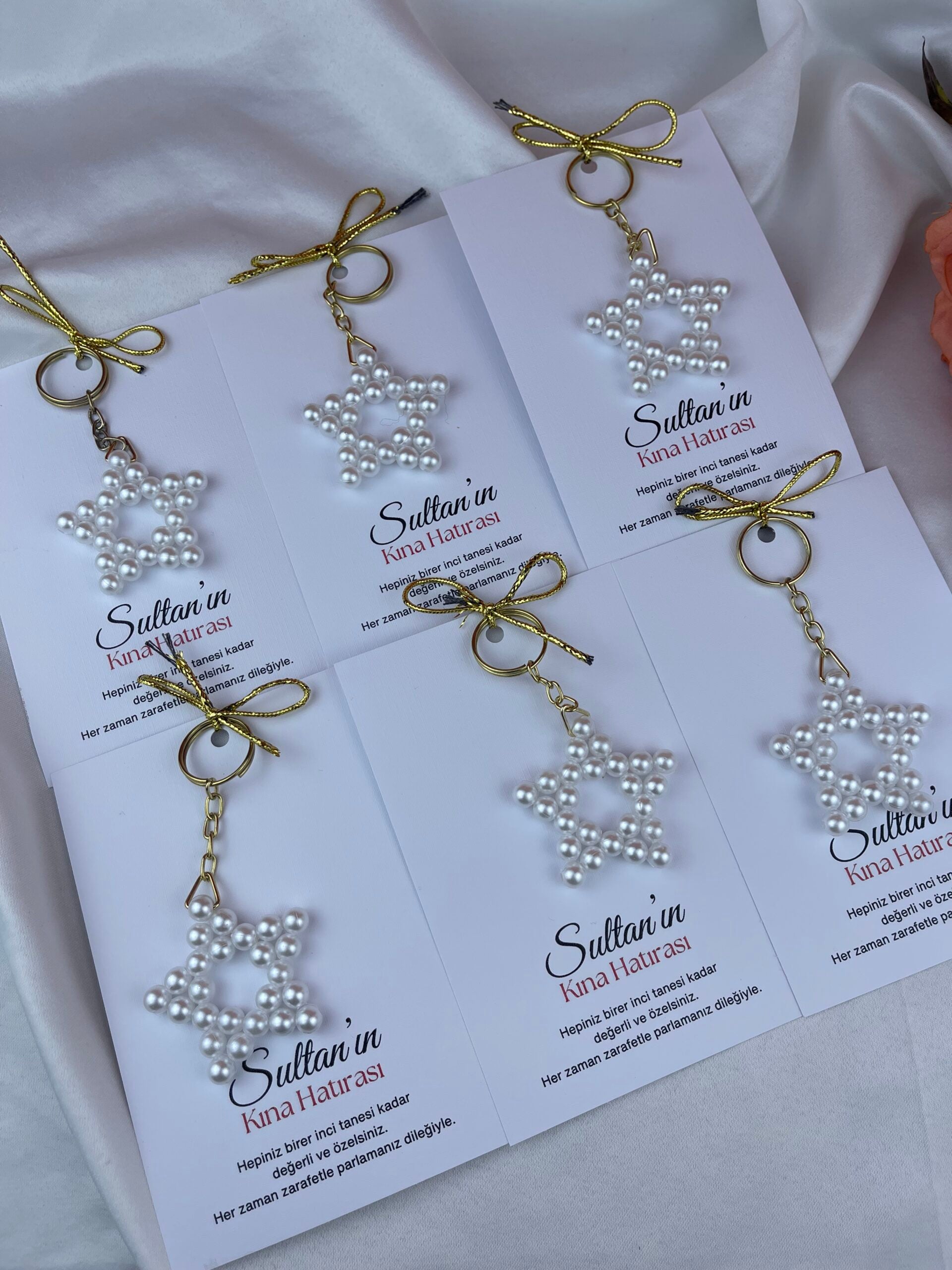 Besondere Perlenstern-Schlüsselanhänger als Versprechens- und Verlobungsgeschenk
